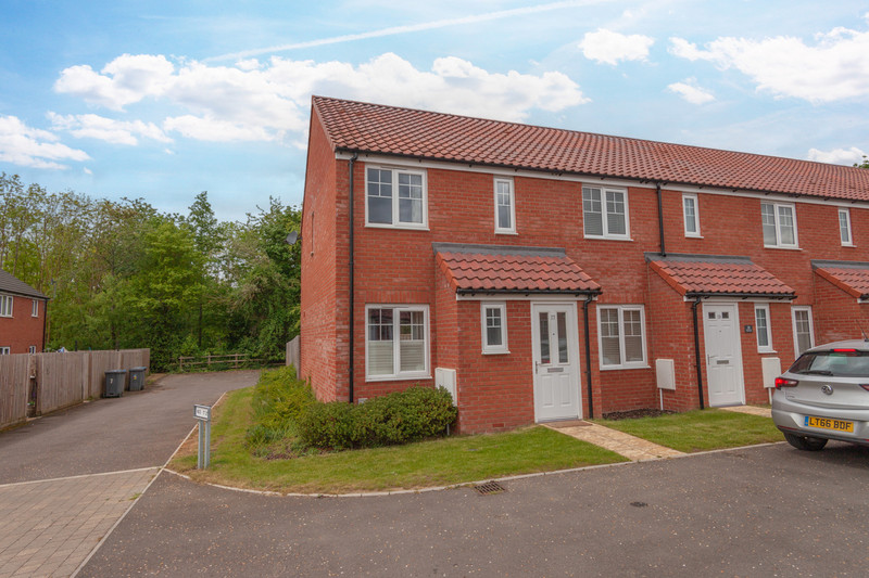 A well presented two bedroom end-terraced home in a cul-de-sac position with living room, cloakroom and kitchen/diner. There's an enclosed rear garden and two parking spaces and no onward chain.