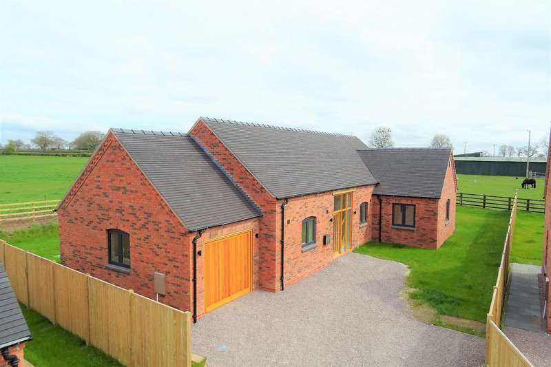 A brand new four bedroom detached barn style residence with ensuite to master bedroom. Occupying a large plot located in a small private exclusive development within the beautiful village of Yeaveley. The gross internal area is 2,350sq.ft.