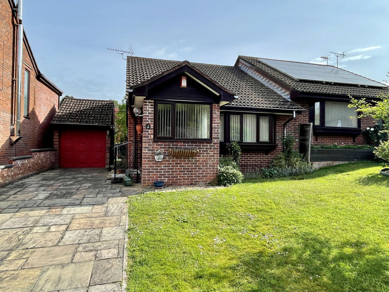 A well presented, semi detached bungalow standing on level plot within this popular residential cul de sac. Porch, Lounge/Diner, Kitchen, Two Bedrooms, Modern Shower Room, Conservatory, Gardens, Driveway, Single Garage, PVCu D/G, GCH, No Onward Chain.